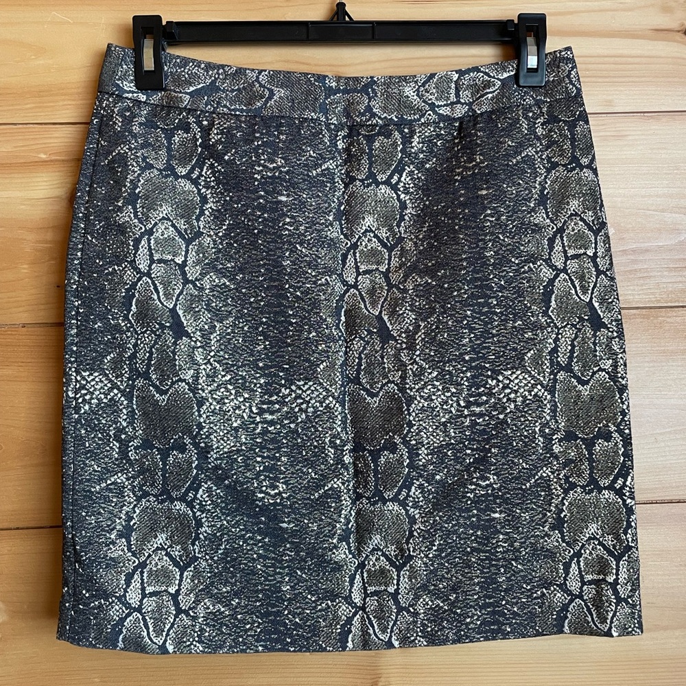 Shiny gold snakeskin mini skirt